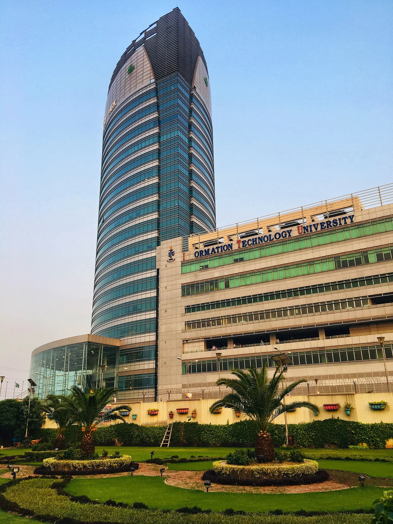 Arfa Software Technology Park tower in Lahore beside the Information Technology University building and gardens