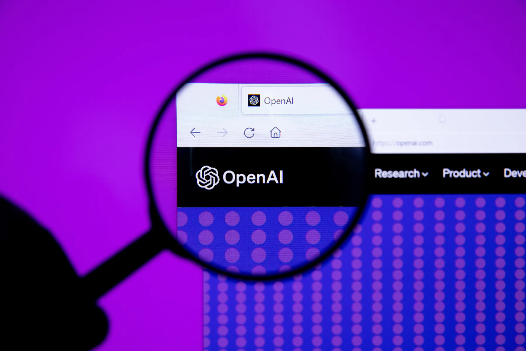 Magnifying glass over the OpenAI logo on the company website in a browser tab, purple background