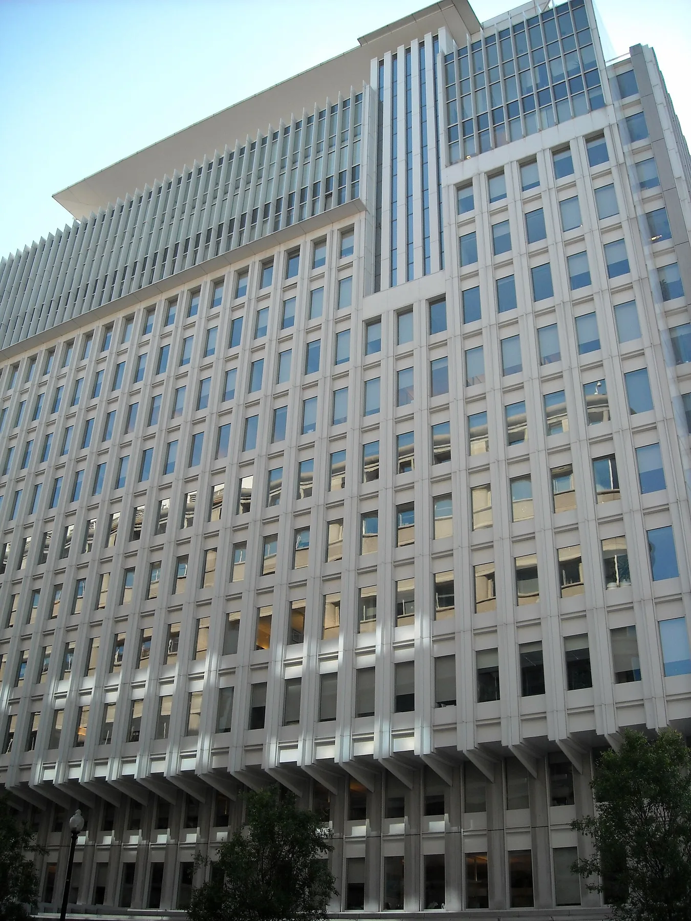 Tall office building with rows of windows, the World Bank headquarters in Washington, seen from the street