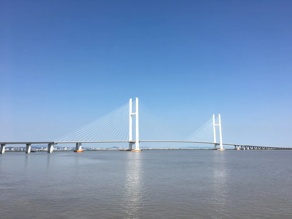 Kim Jong Un crosses new Yalu River Bridge into China on first trip abroad in a year