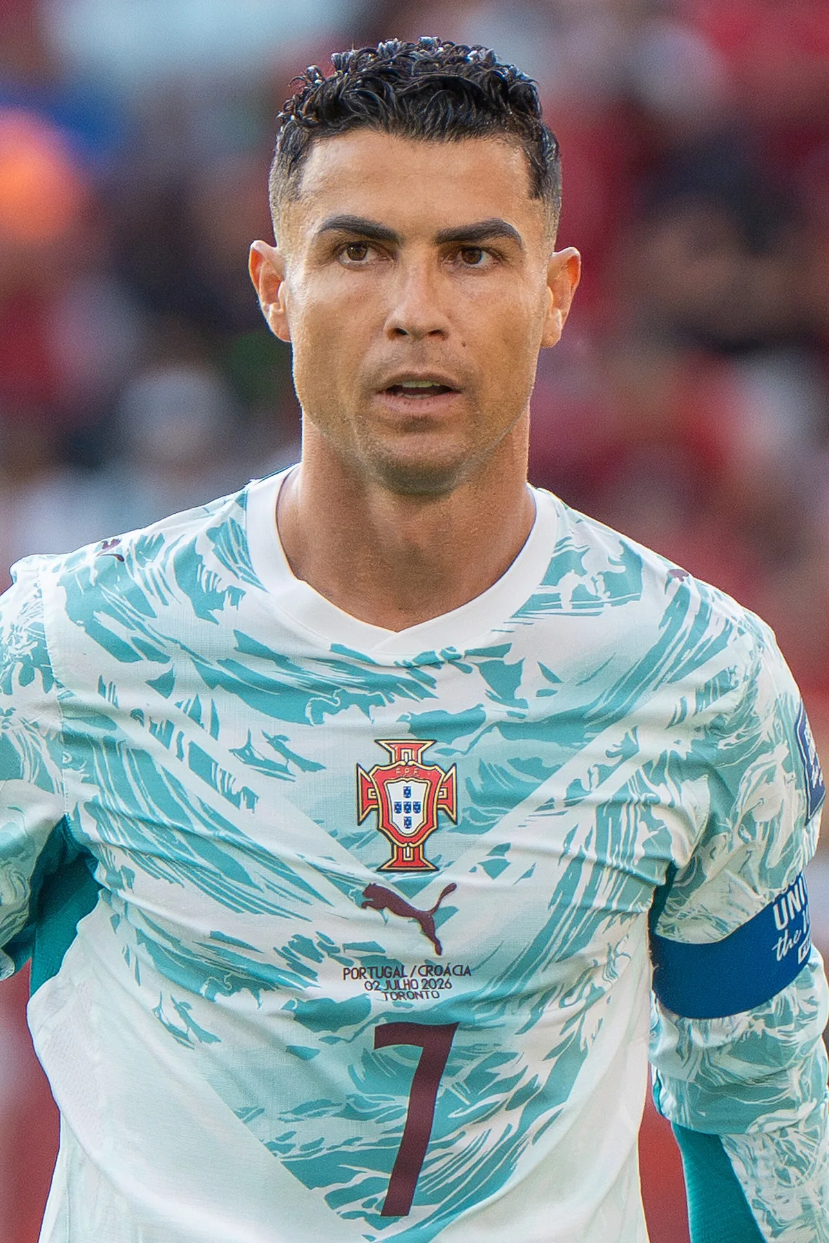 Cristiano Ronaldo wearing Portugal number 7 shirt and captain armband during a match
