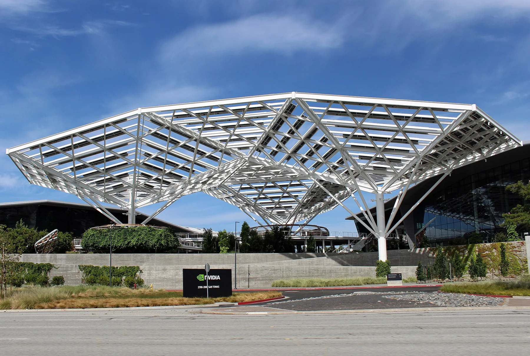 Nvidia headquarters in Santa Clara with its white steel lattice canopy and Nvidia sign